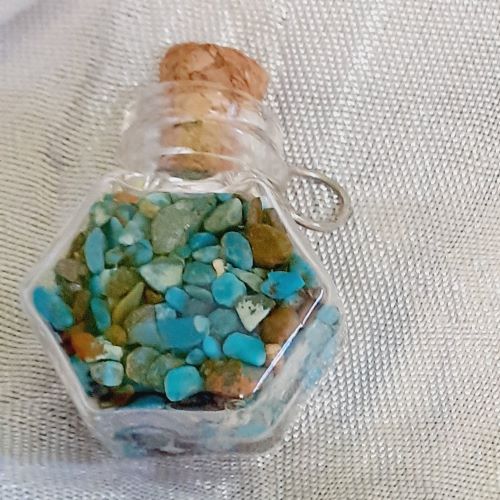 Colgante botellita chip minerales